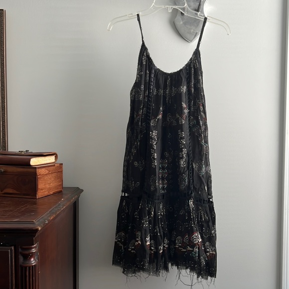 Free People Dresses & Skirts - Free People XS/TP mid length dress adjustable, spaghetti straps, Aztec design.